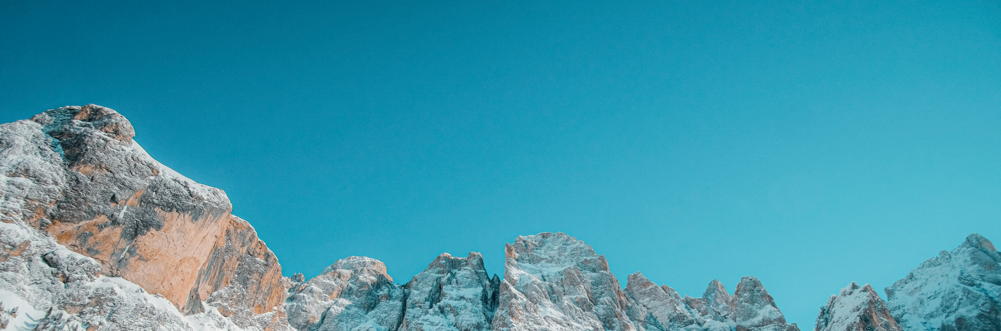 decorative image of snow-covered mountains