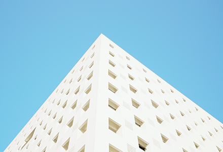 Close up image of the top corner of a building 