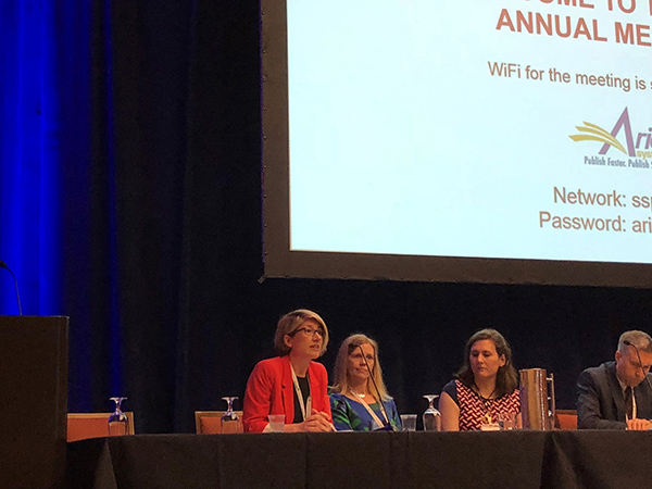 Alison Labbate (left) speaks as a panelist for the session